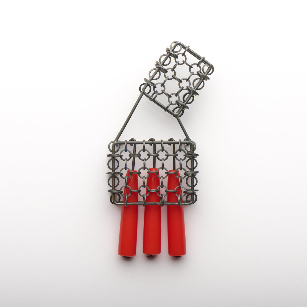 Brooch with red beads